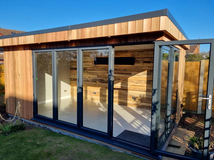 Garden Office with Black Glass Infrared Heat Panel, Wireless Thermostate, LED Down Lights and USB Socket Outlets in Bearwood Bournemouth by Probyn Electrical Ltd Dorset