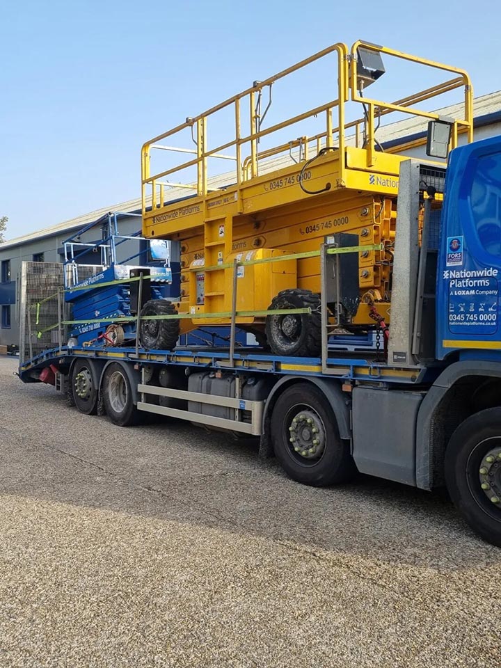 Industrial Work - Scissor Lift Hire for New Lighting Installation Job at Ferrari Garage in Poole Dorset by Probyn Electrical Ltd Dorset